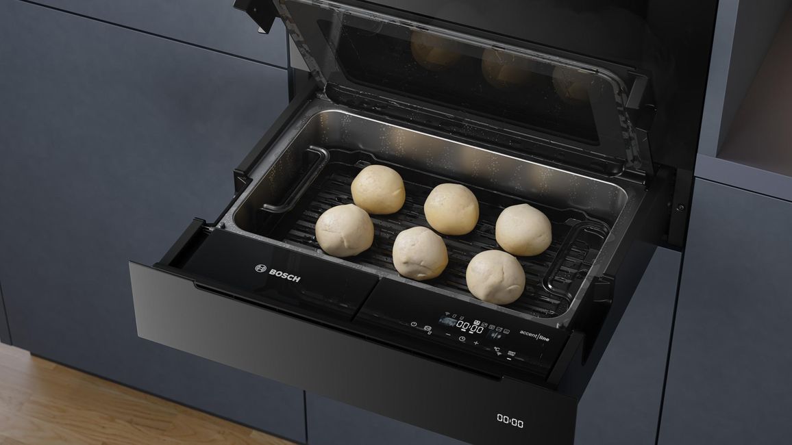 Tiroir vapeur Bosch Série 8 ouvert, pâtons de pain en levée