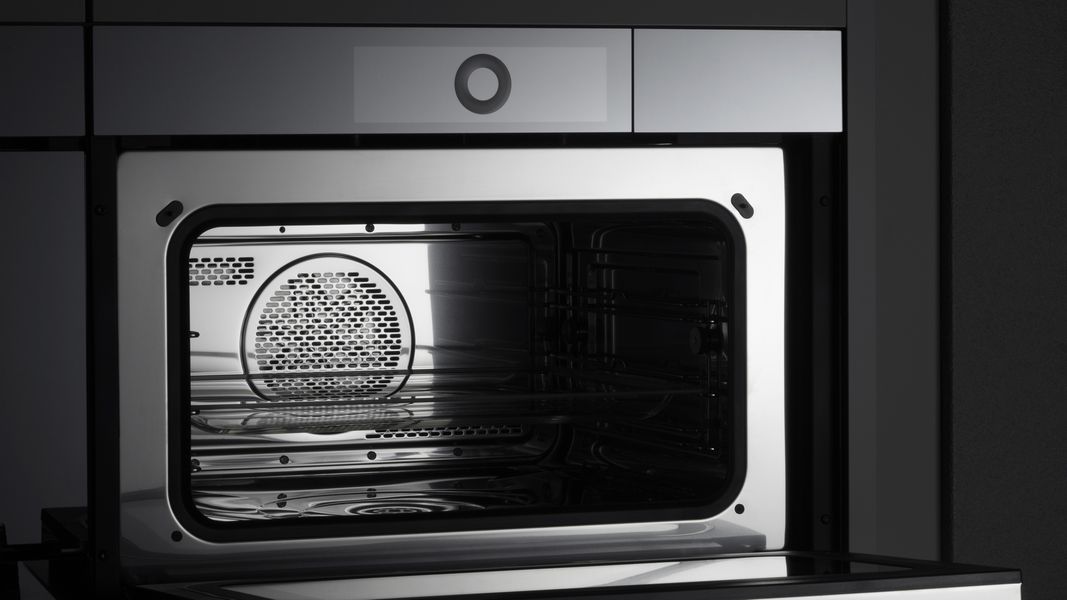 Four vapeur combiné V-ZUG CombiSteamer PowerSteam porte ouverte, enceinte inox