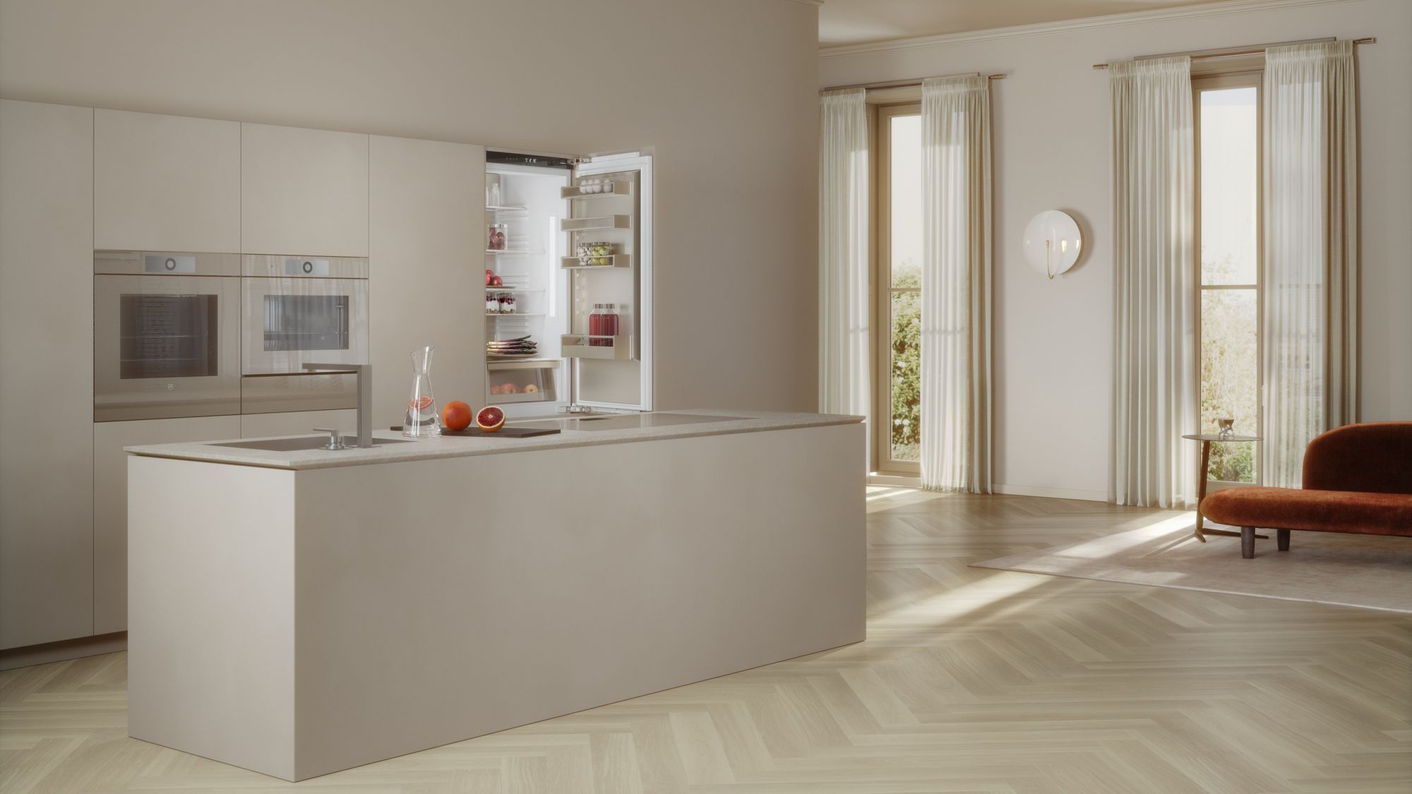 Cuisine claire équipée V-ZUG en finition Pearl, îlot et réfrigérateur Supreme ouvert